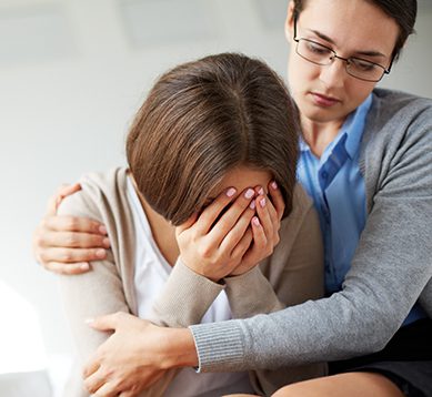 Female support Image of compassionate psychiatrist comforting her crying patient